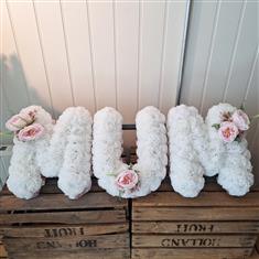 MUM letters with pink sprays